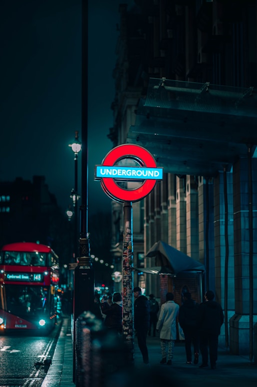 London Underground sign at night